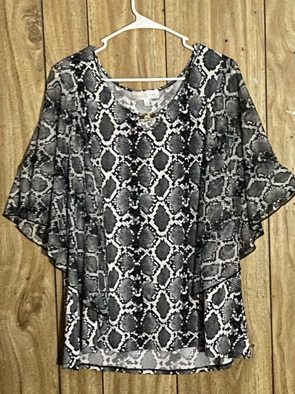 Black and White Snake-Print Blouse with Gold Accent